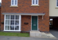Combination bay & entrance canopy